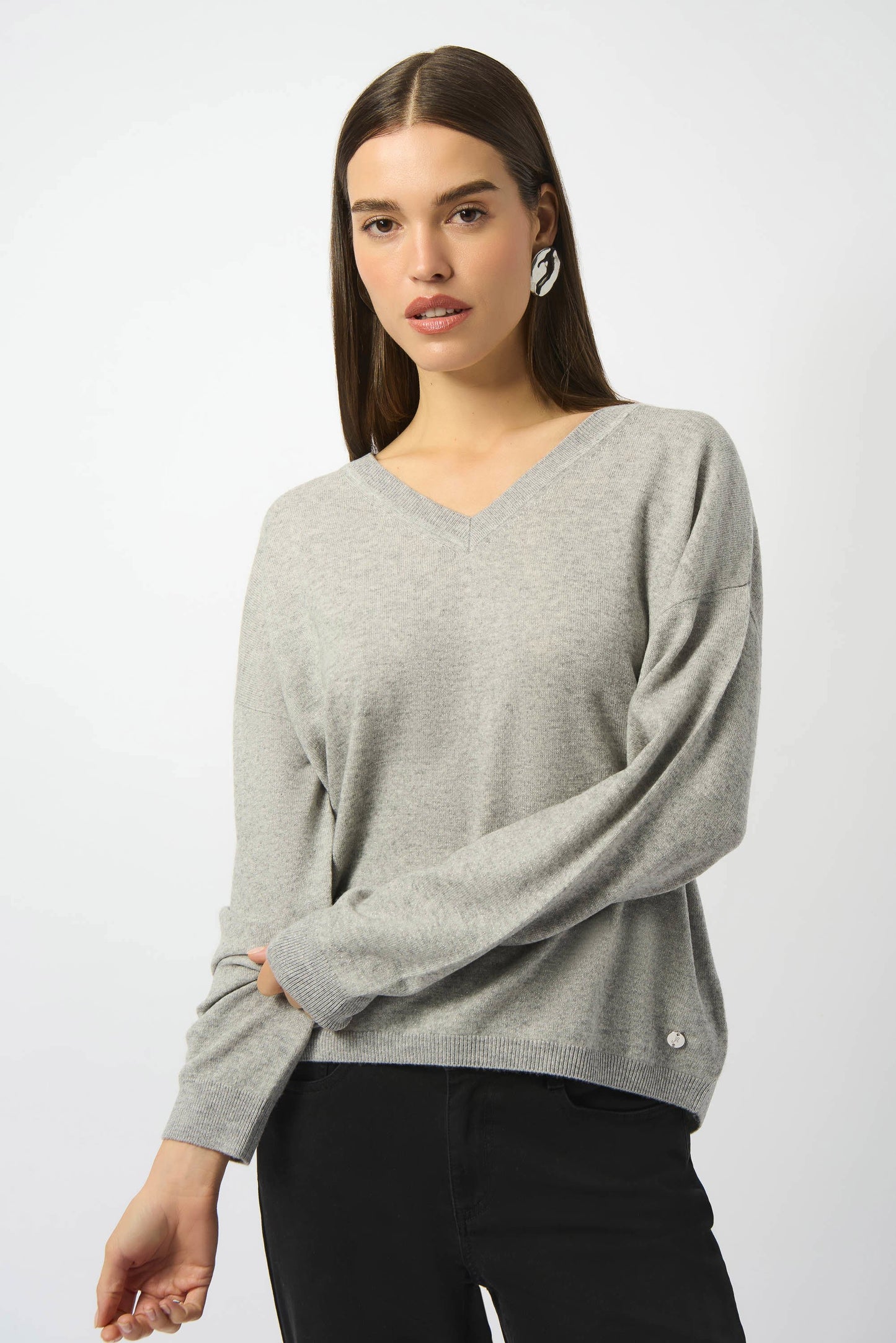 This versatile v-neck sweater from Joseph Ribkoff perfectly blends into any casual or workwear ensemble. Find it now at Harbour Thread in Burlington, VT!