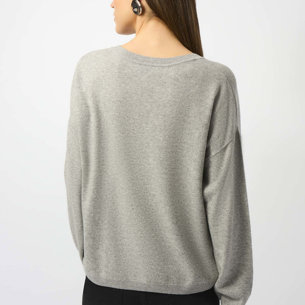
                      
                        Women's pullover style grey sweater
                      
                    