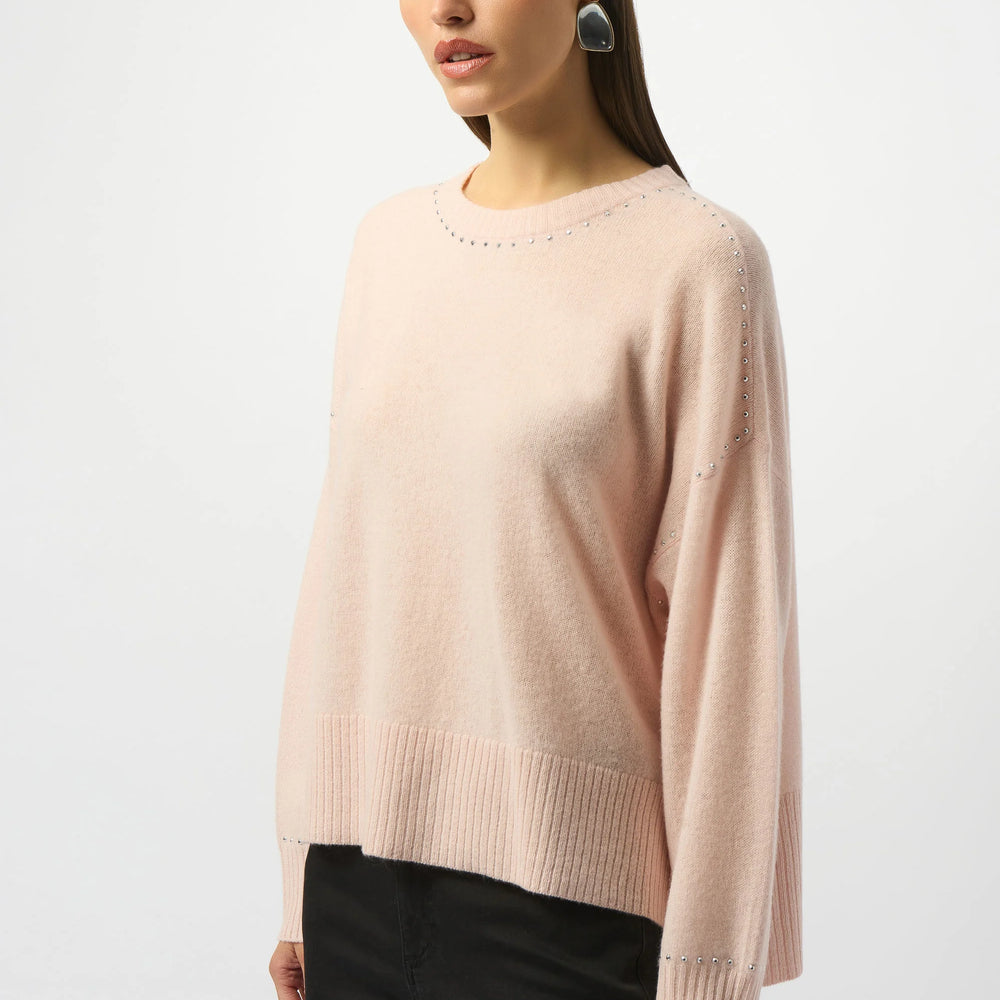 Elevate your everyday style in the luxe cashmere sweater featuring delicate stud detailing. Find yours today at Harbour Thread boutique in Burlington, VT. 