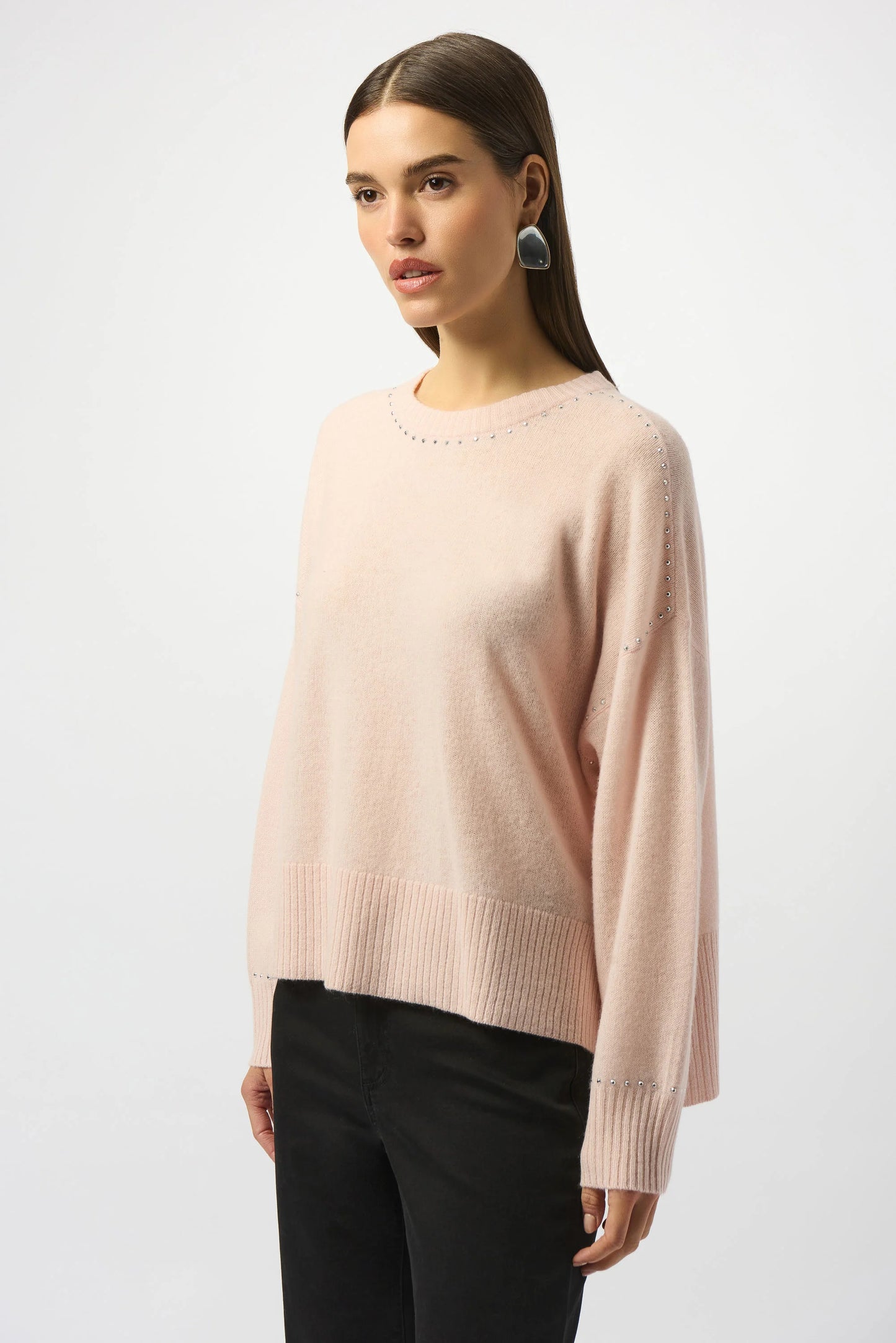 Elevate your everyday style in the luxe cashmere sweater featuring delicate stud detailing. Find yours today at Harbour Thread boutique in Burlington, VT. 
