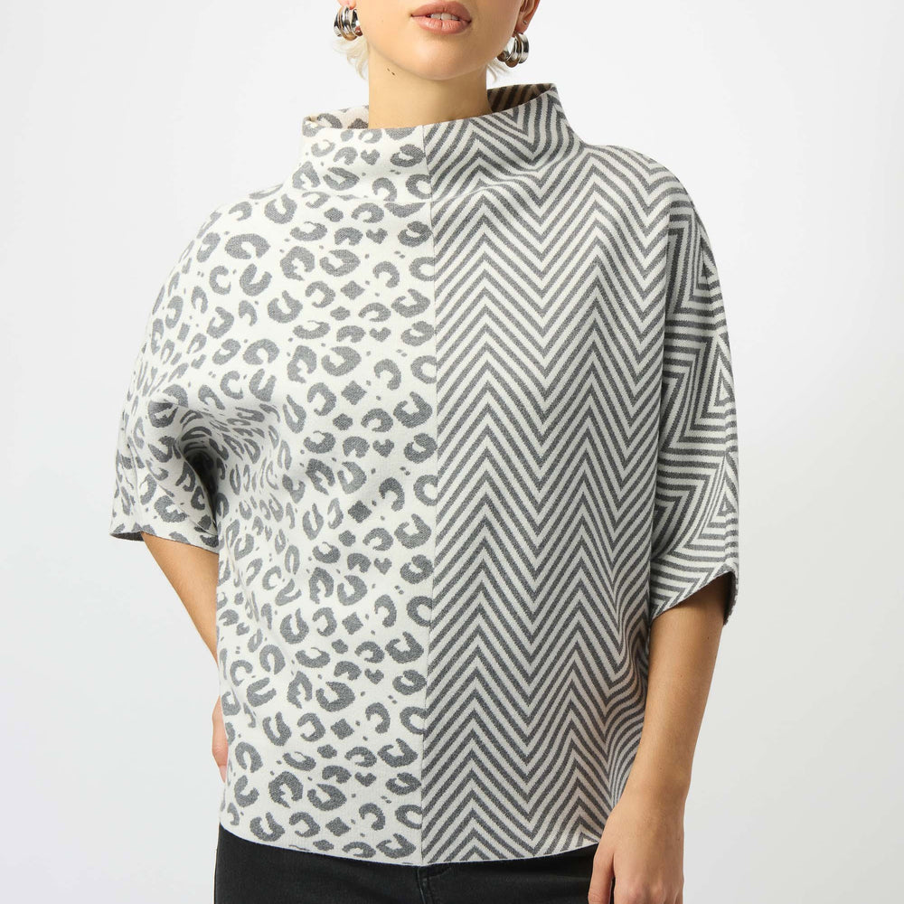 This distinctive sweater top from Joseph Ribkoff offers a playful mixed print design in a neutral colorway. Find yours today at Harbour Thread in Burlington, VT. 