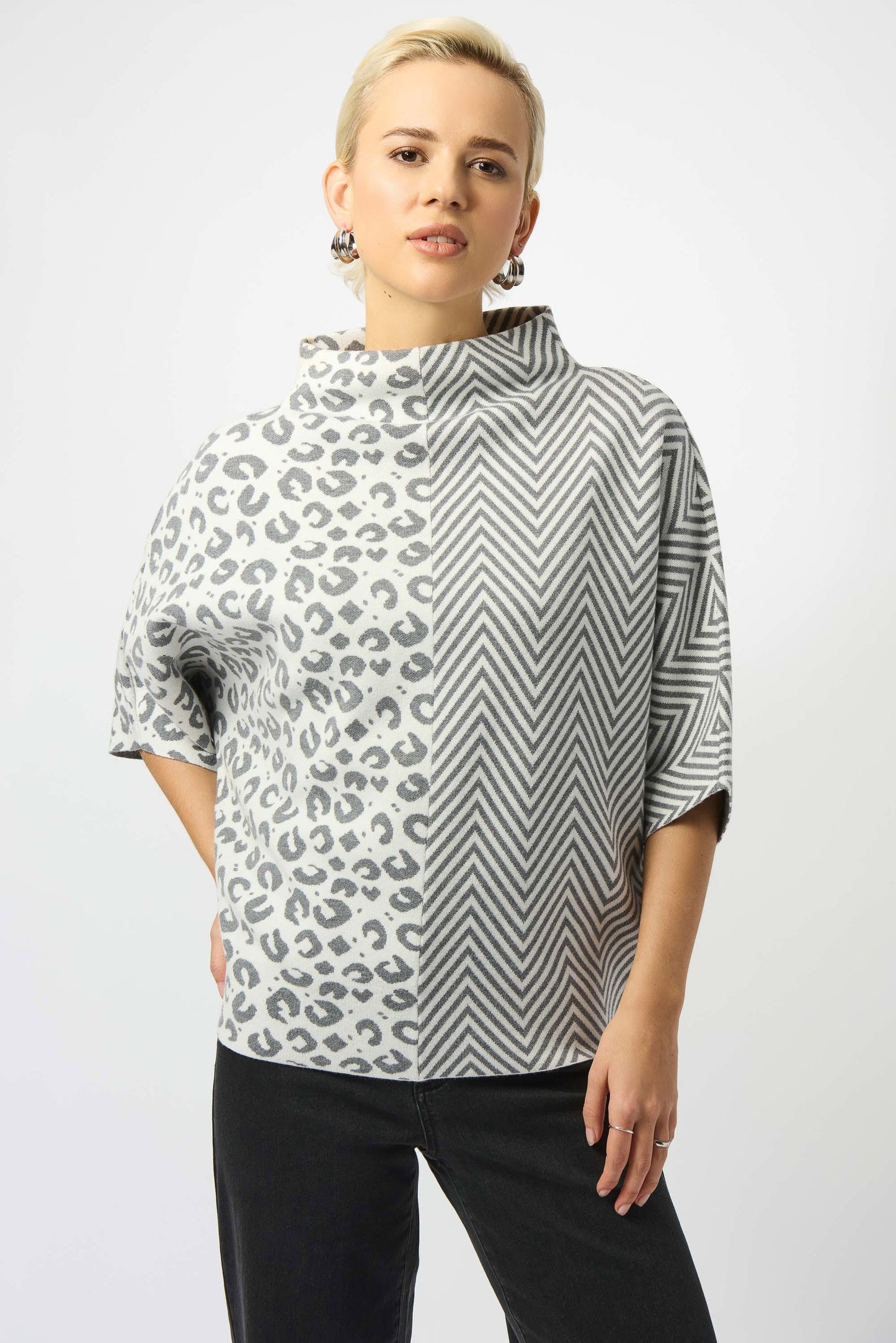This distinctive sweater top from Joseph Ribkoff offers a playful mixed print design in a neutral colorway. Find yours today at Harbour Thread in Burlington, VT. 