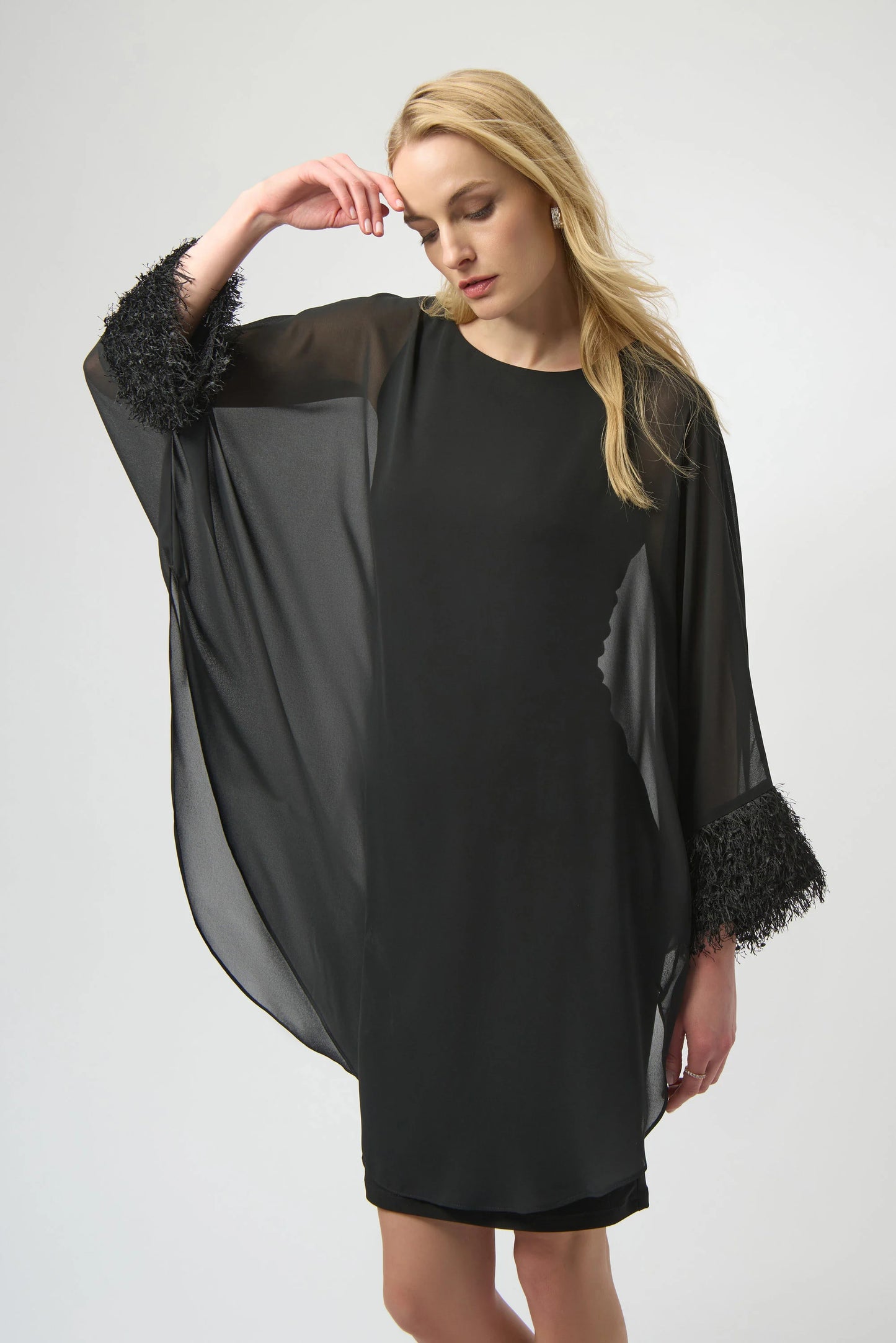 Add a touch of drama to your next event with this head-turning chiffon layered dress from Joseph Ribkoff, now at Harbour Thread boutique. 