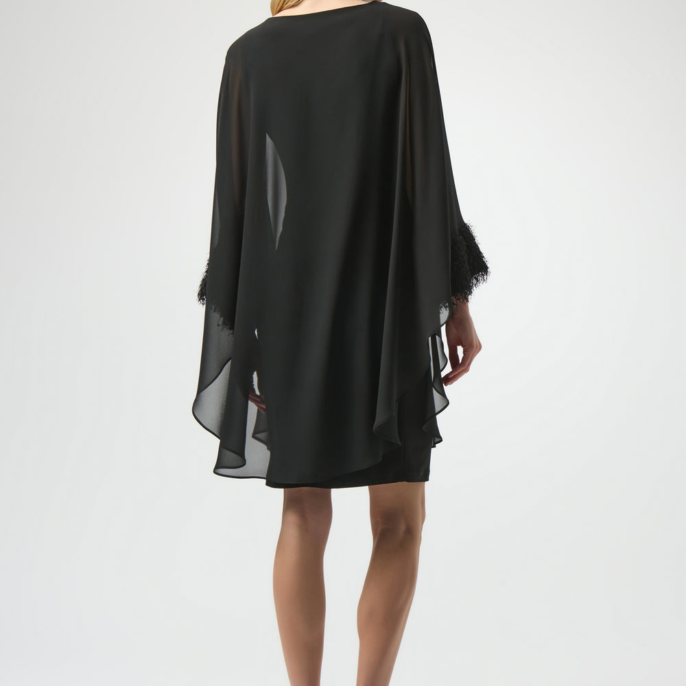 
                      
                        Woman wearing a black dress from Joseph Ribkoff
                      
                    