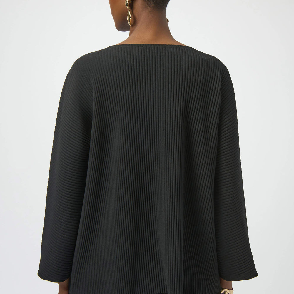 
                      
                        Woman wearing a black top from Joseph Ribkoff
                      
                    