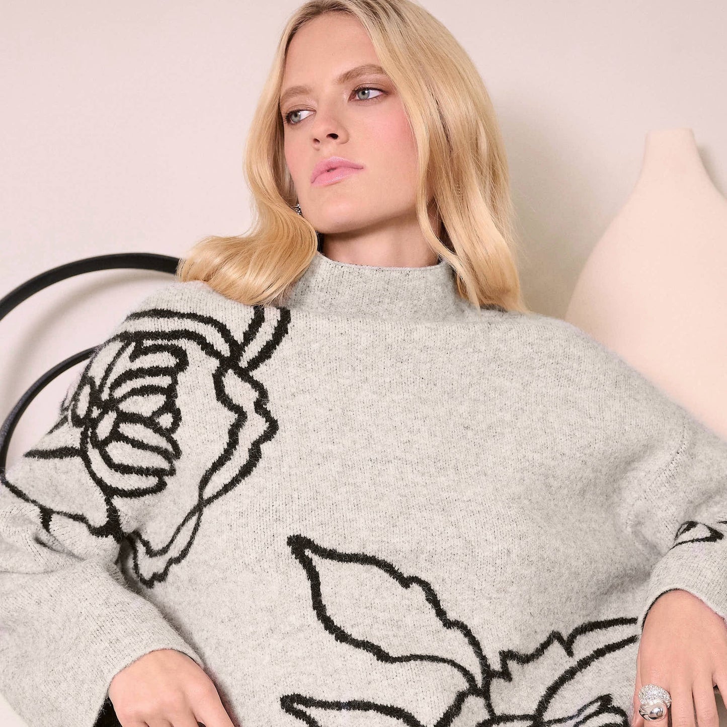 A woman wearing the Sweater Knit Floral Print Pullover by Joseph Ribkoff