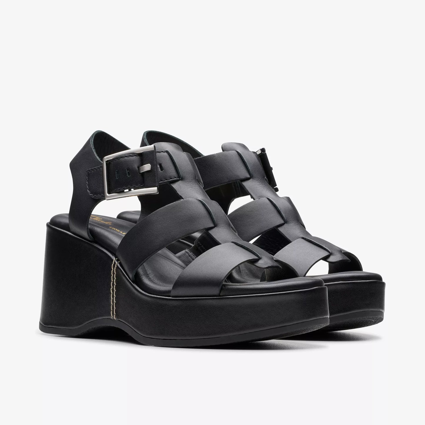 The black leather Manon Cove Wedge Sandals by Clarks