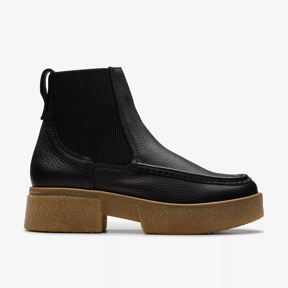 
                      
                        Side view of the Black Leather Linoso Top Chelsea Boot with back pull tab from the brand Clarks
                      
                    