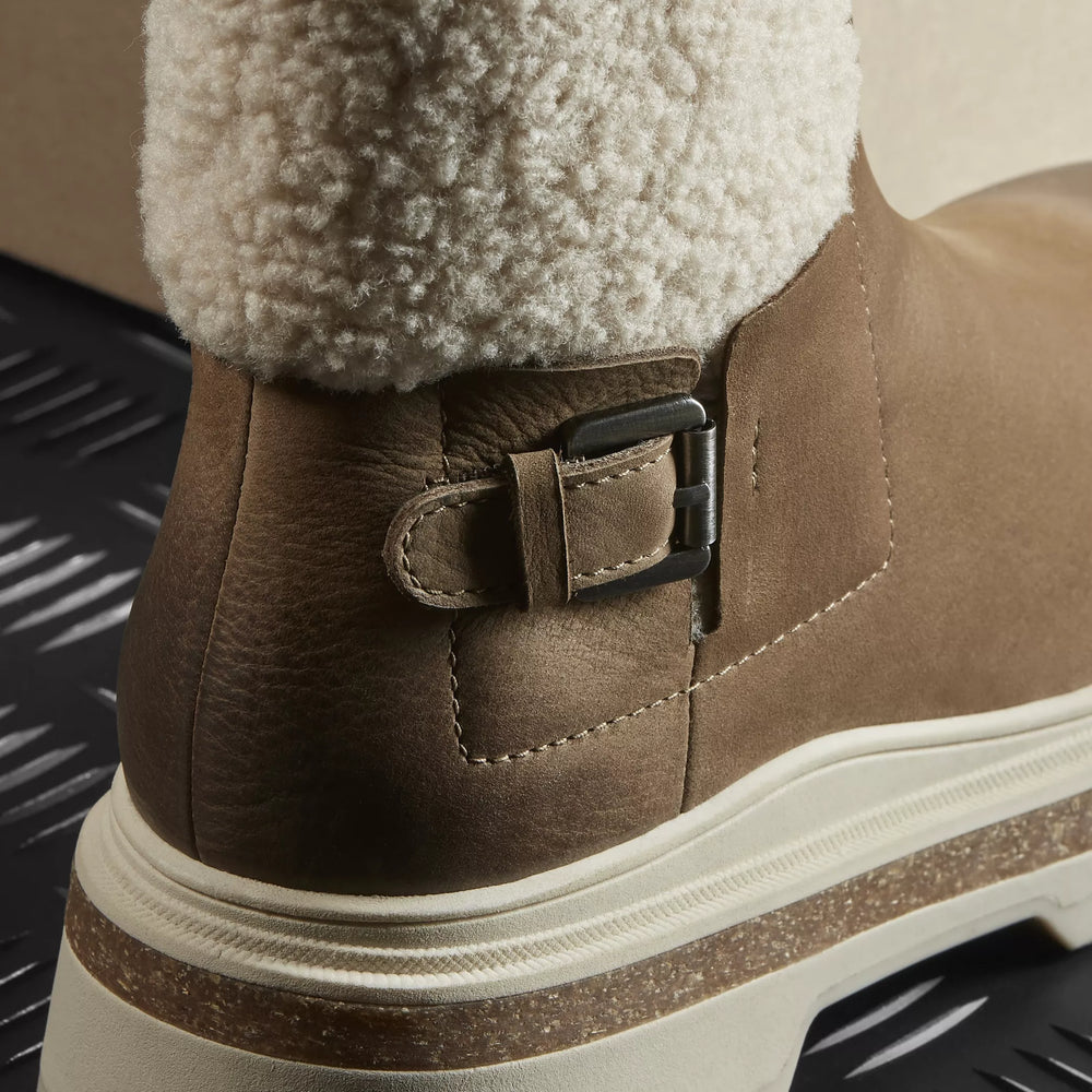 
                      
                        Back design detail on the Dark Sand Warmlined Hencroft Madi Waterproof Boot by the brand Clarks
                      
                    