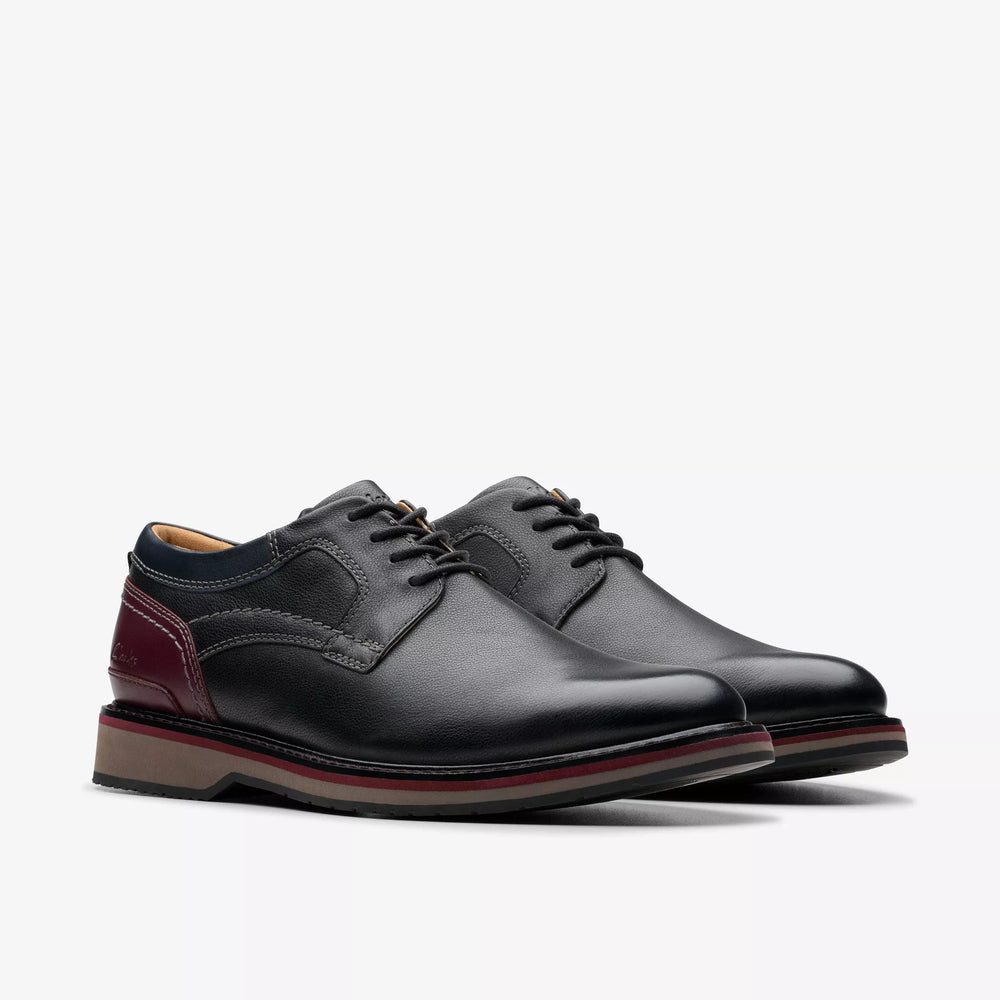 A pair of the Black Leather Monahan Plain Oxford Shoes by the brand Clarks