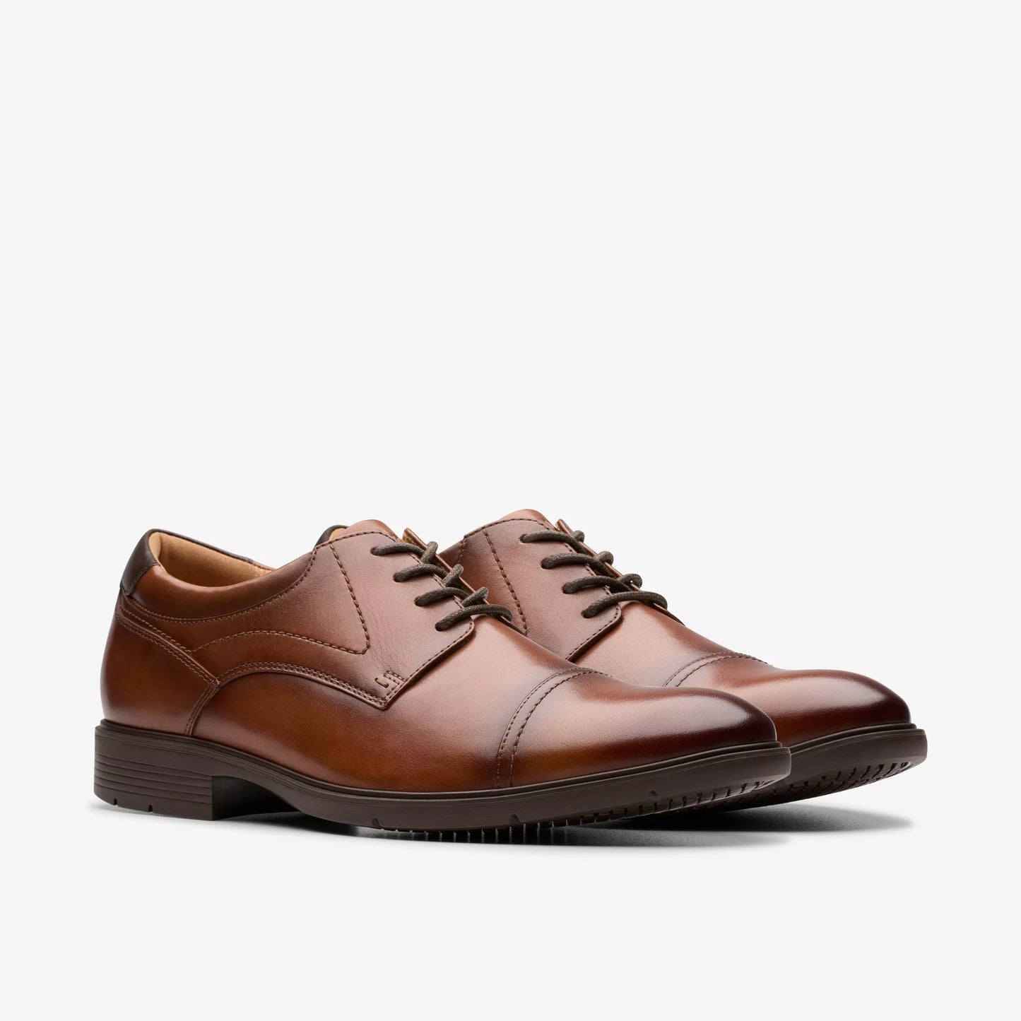 The Clarks Eldredge Cap men's shoe in Dark Tan Leather