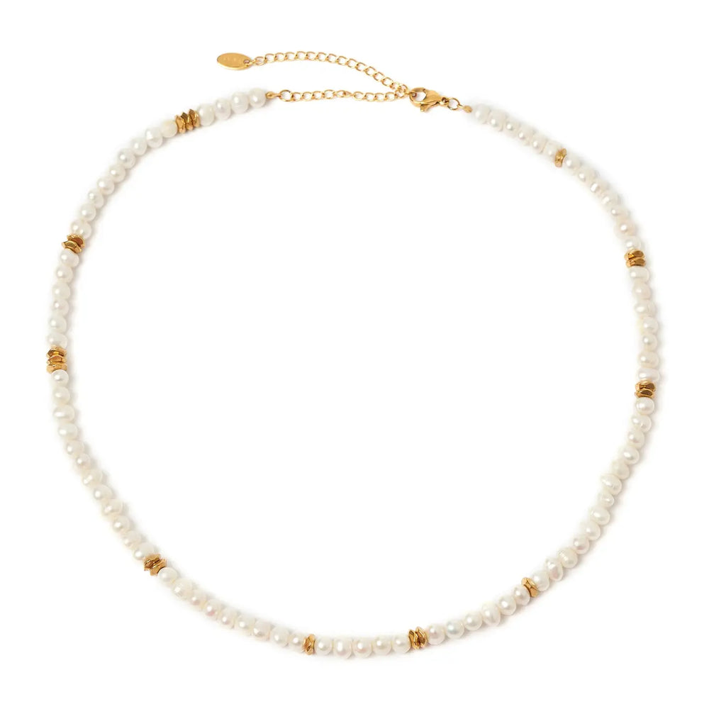 
                      
                        The Sloane Pearl Necklace, with feshwater pearls and crushed gold details, by Arms of Eve
                      
                    