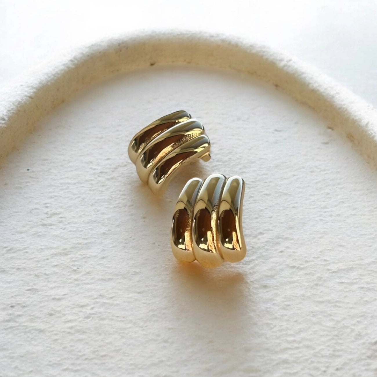 The Boem Collection Simone Studs features a timeless croissant shape to elevate any outfit