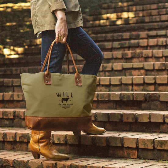 Person carrying the Will Leather Goods Utility Tote in Olive