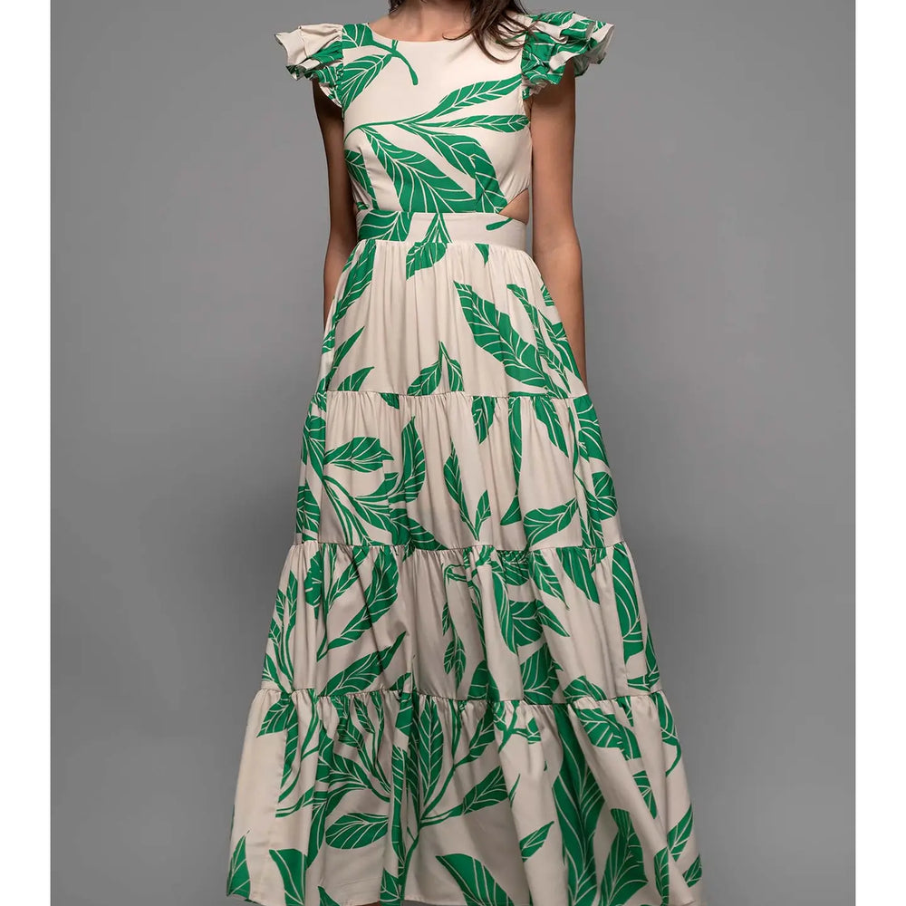 The high neckline and maxi length skirt on this tropical palm leaf dress at Harbour Thread are balanced out by a stunning strappy tie back and cutout details. 