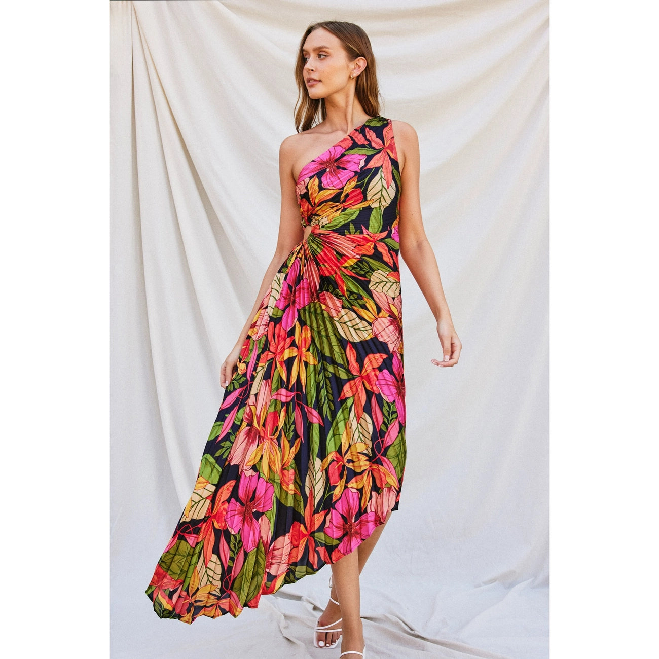 Make a statement in this beautifully bold one-shoulder floral maxi dress at Harbour Thread Burlington, with all over pleating detail and side keyhole cutout. 