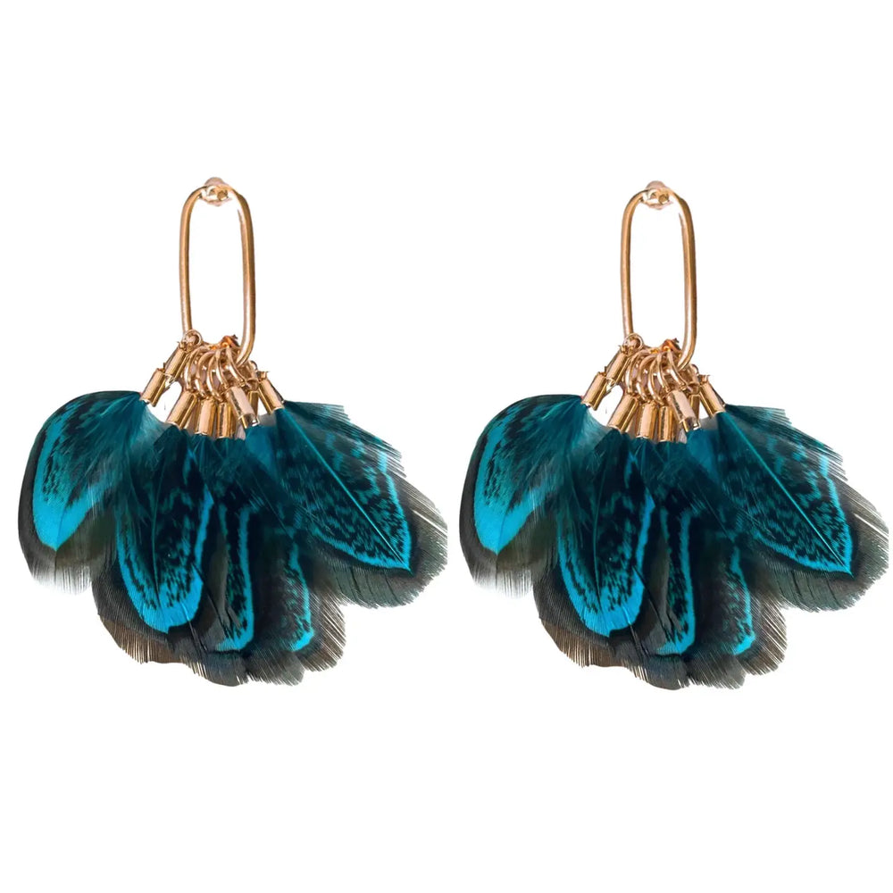 
                      
                        The Peacock Feather Tassel Statement Earrings are available at Harbour Thread in Burlington, VT. 
                      
                    