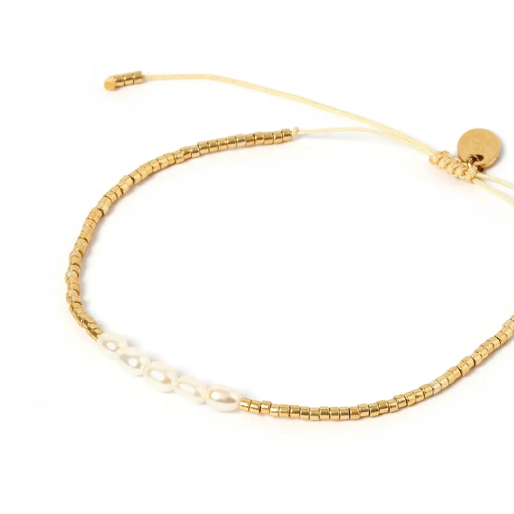 
                      
                        Design detail on the Seline Gold and Pearl Bracelet by Arms of Eve
                      
                    