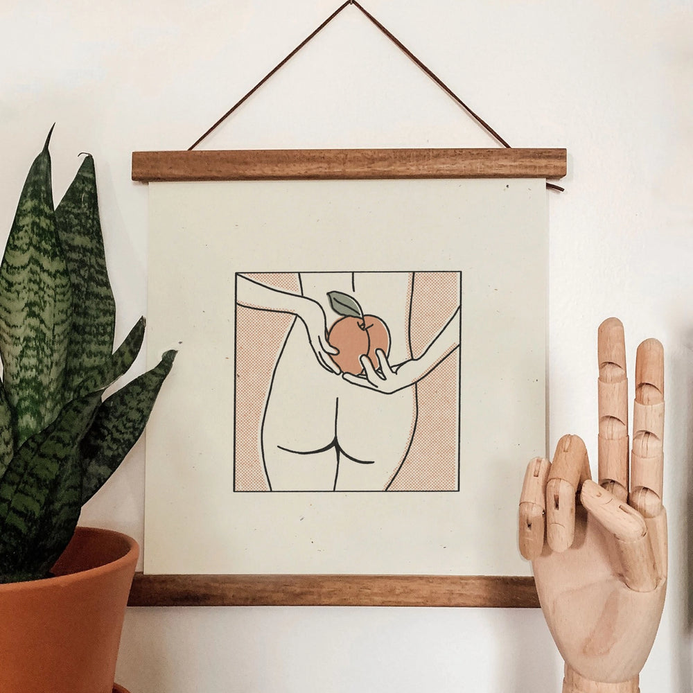 the "Nice Peach" 12x12 Print by colorbloKC hanging in a frame on the wall