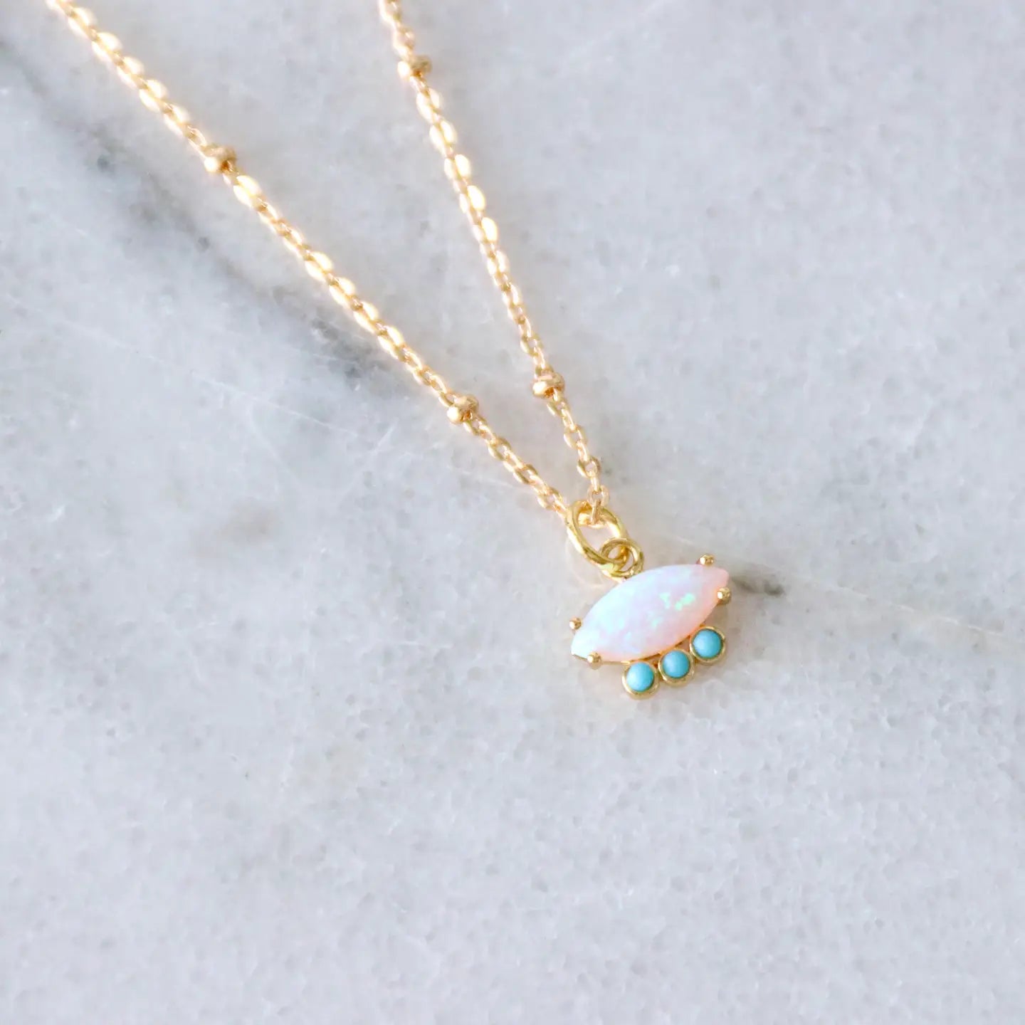 Pendant detail on the Opal and Turquoise Necklace by Mesa Blue