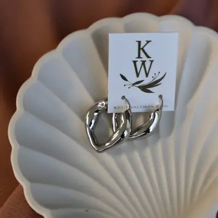 
                      
                        Katie Waltman Organic Silver Hoops
                      
                    