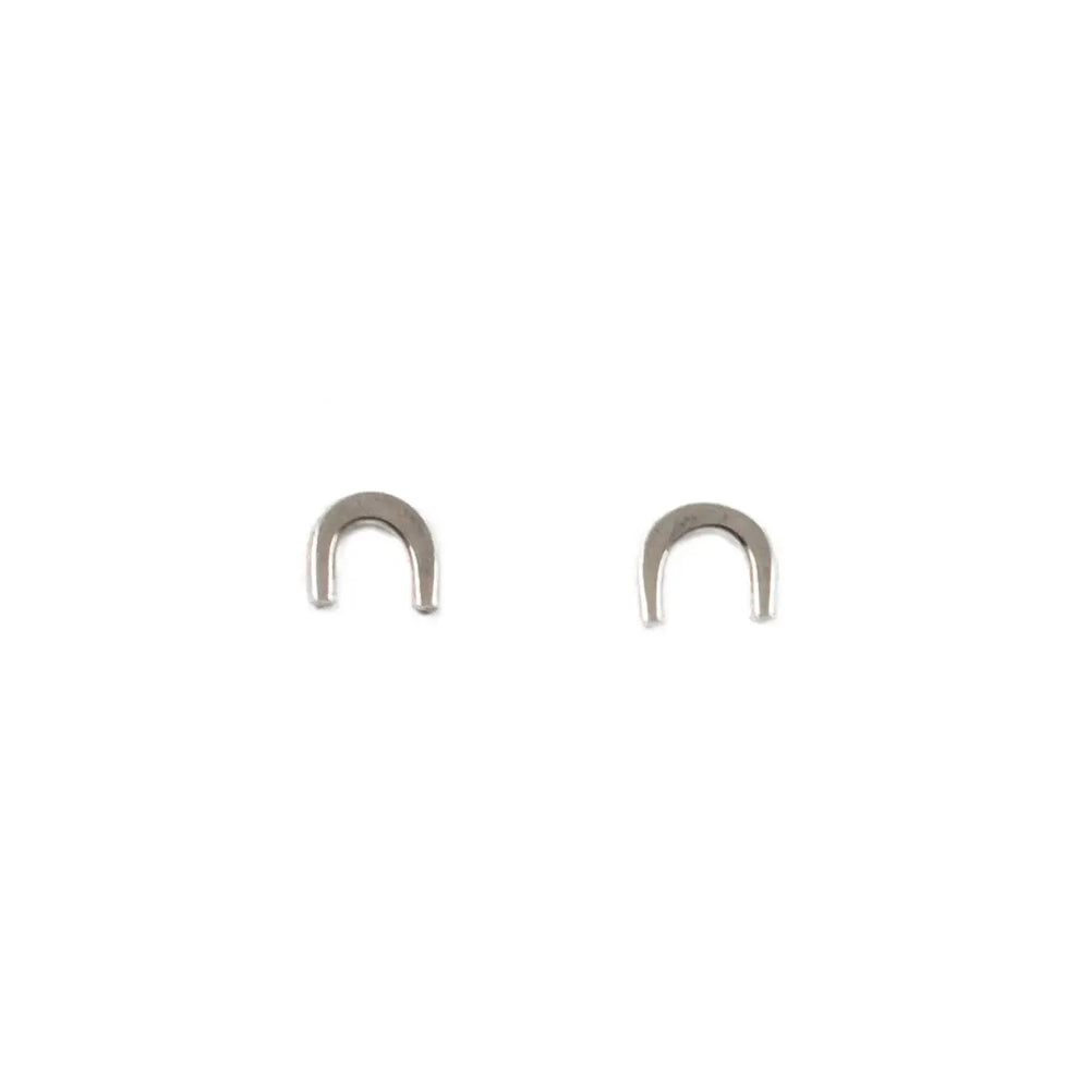 
                      
                        The Sterling Silver Arch Stud Earrings by The Land Of Salt
                      
                    