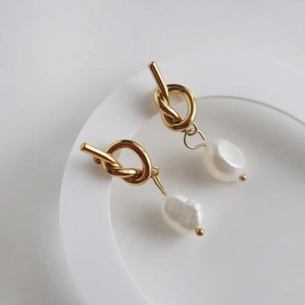 
                      
                        The Knotted Pearl Drop Earrings by Jessa Jewelry at Harbour Thread.
                      
                    