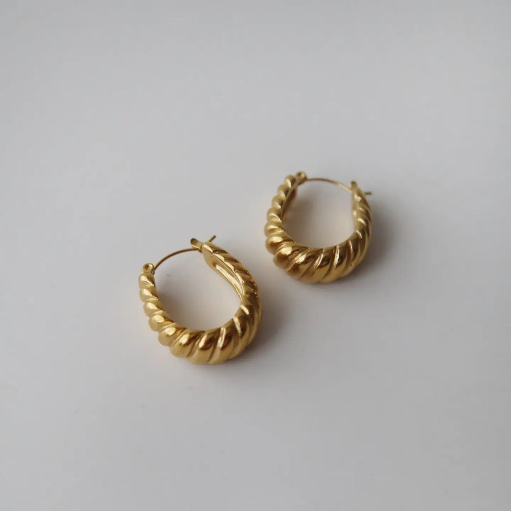 
                      
                        Oval shape hoops with a bold chunky design
                      
                    