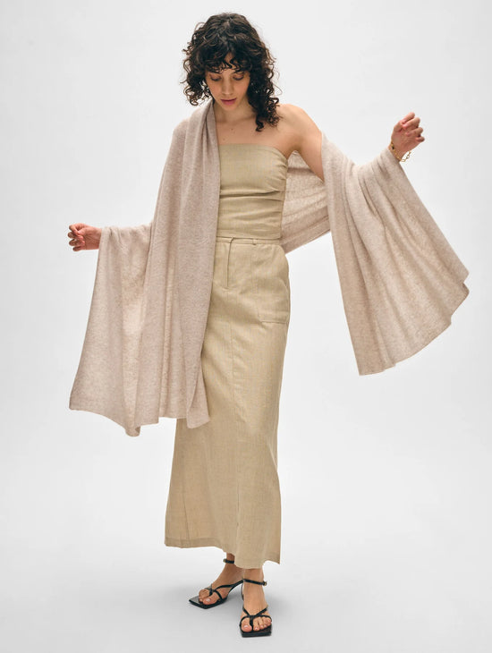 Woman wearing the Sandwisp Heather Cashmere Travel Wrap by White + Warren
