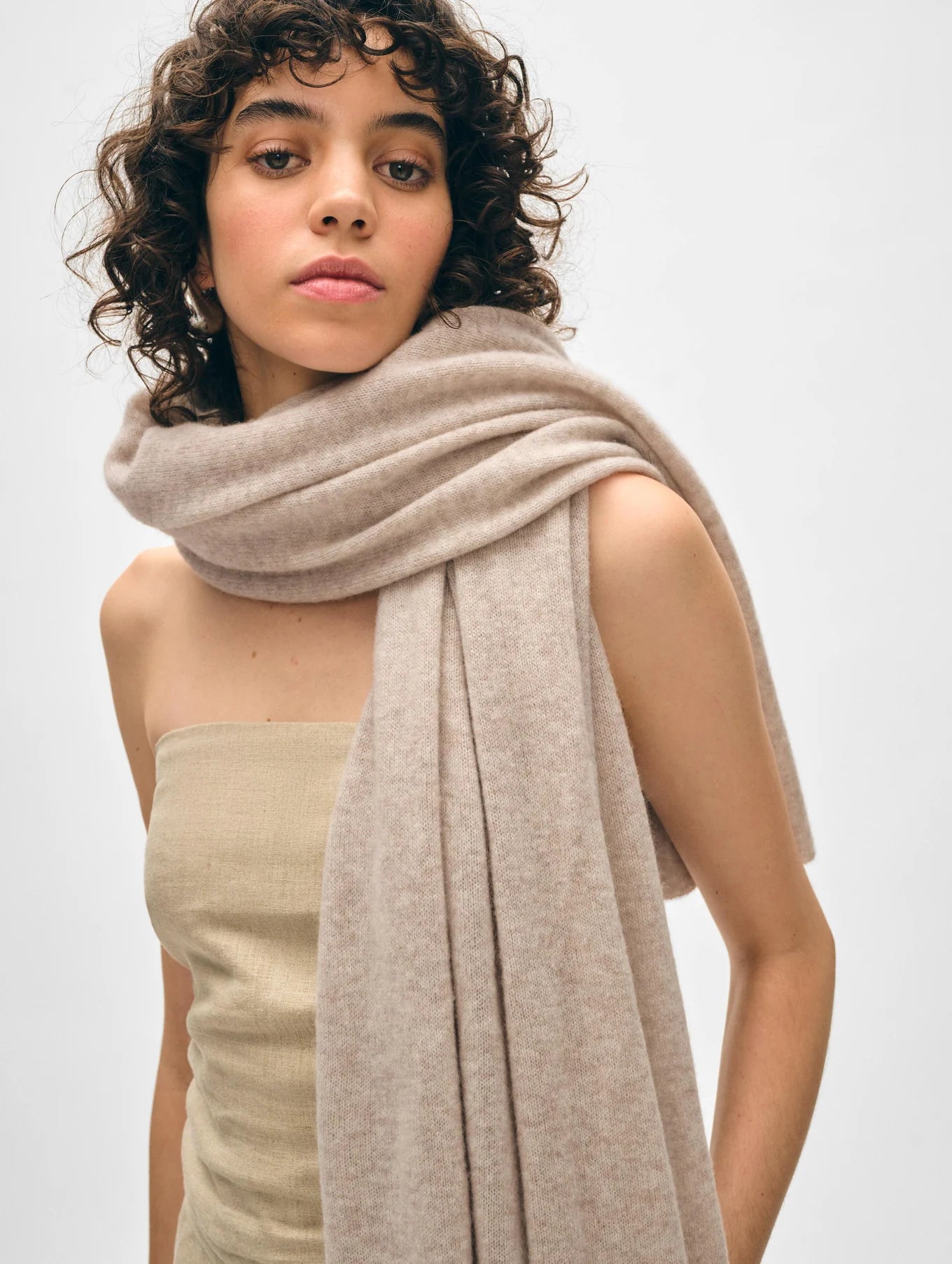 Woman with the Sandwisp Heather Cashmere Travel Wrap by White + Warren wrapped around her