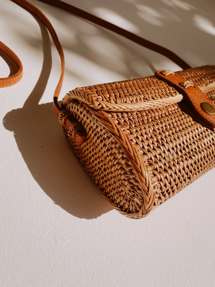 
                      
                        Design details on the Ulan Rattan Purse by Village Thrive
                      
                    