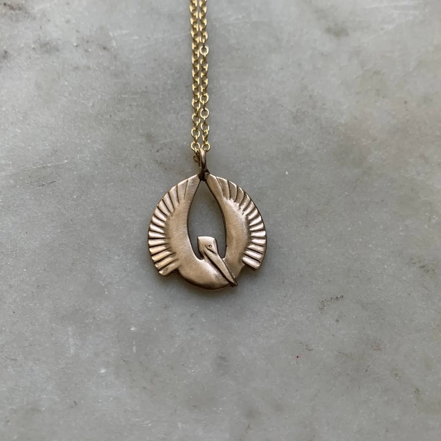 Mimosa Handcrafted Pelican Rising Pendant Necklace