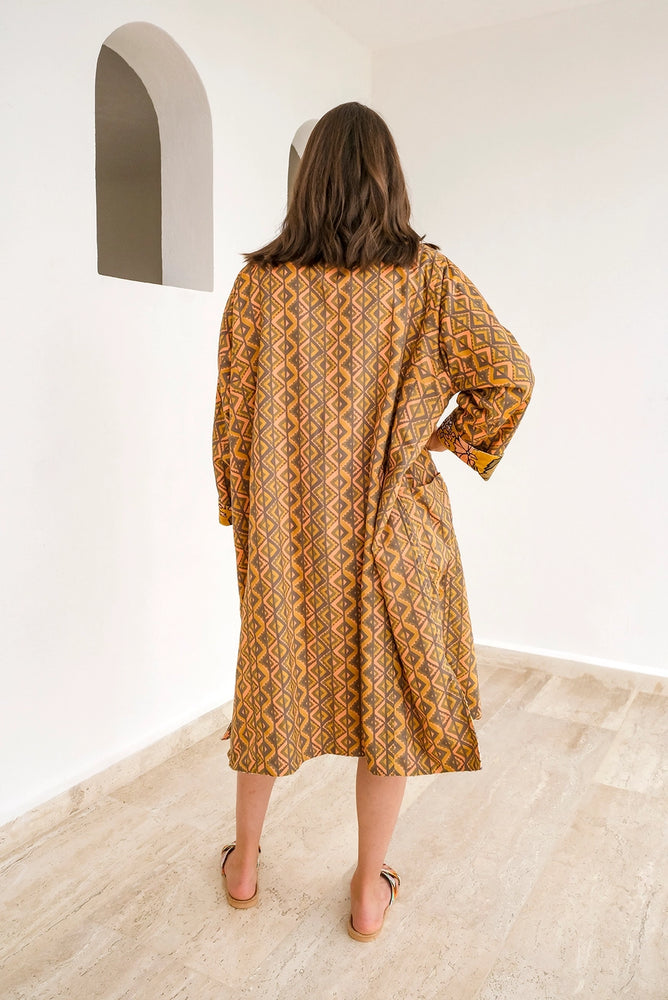 
                      
                        Geometric print side of the Daisy Velvet Reversible Cotton Duster Robe
                      
                    