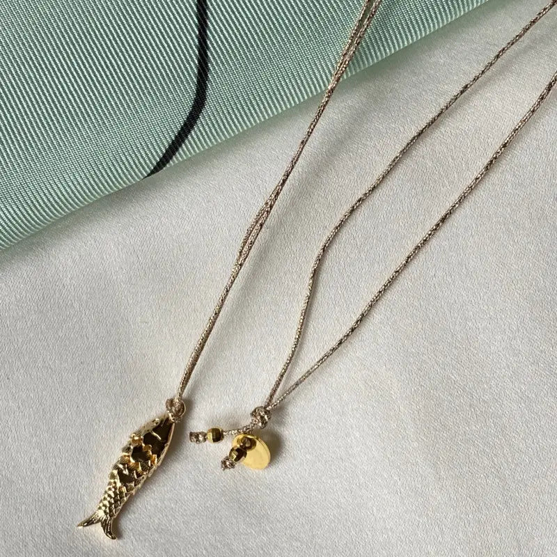 
                      
                        SDB Sardina Gold Plated Fish Necklace
                      
                    