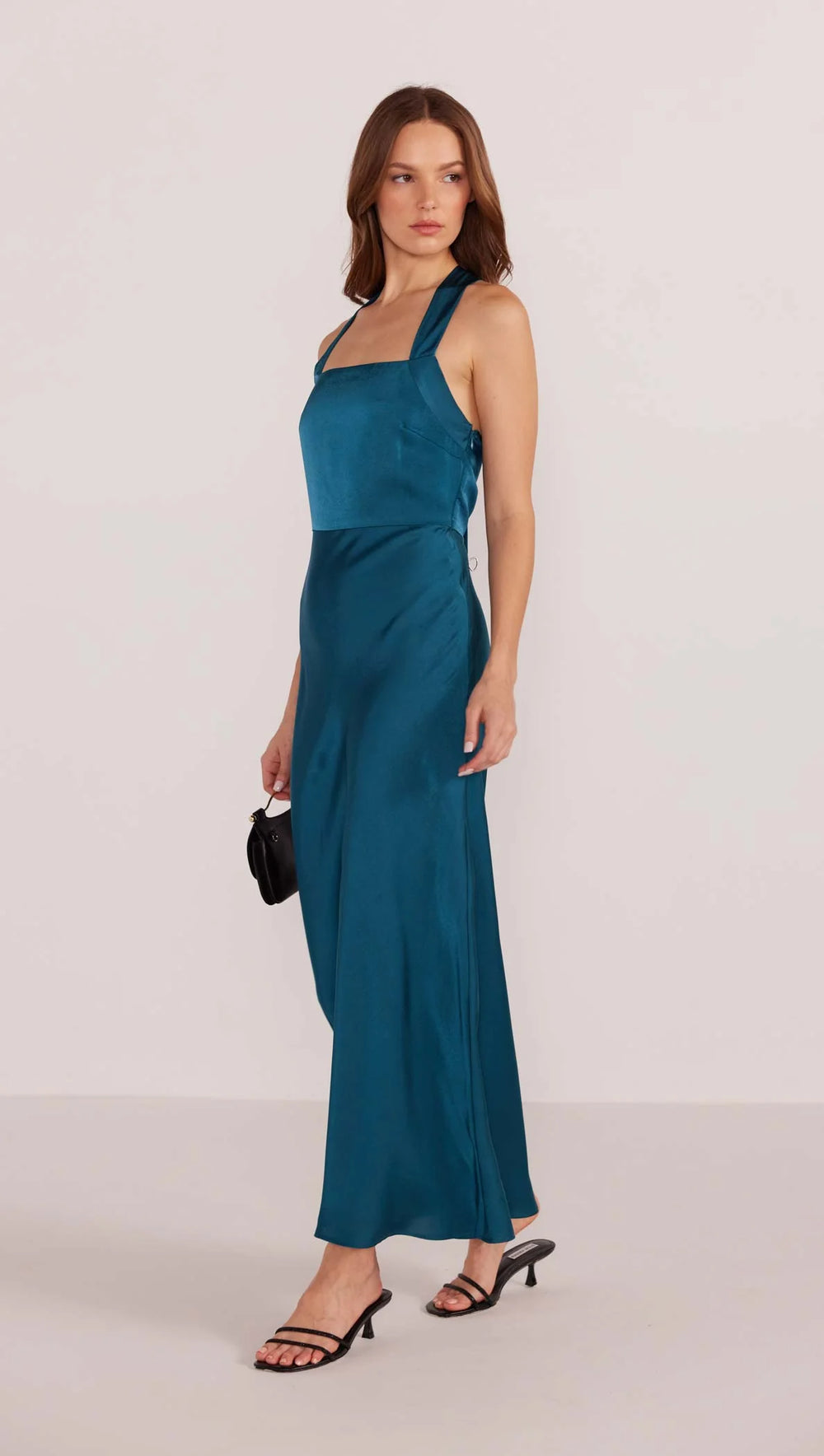 This beautiful maxi dress from MINKPINK features an adjustable halter neck with tie at back