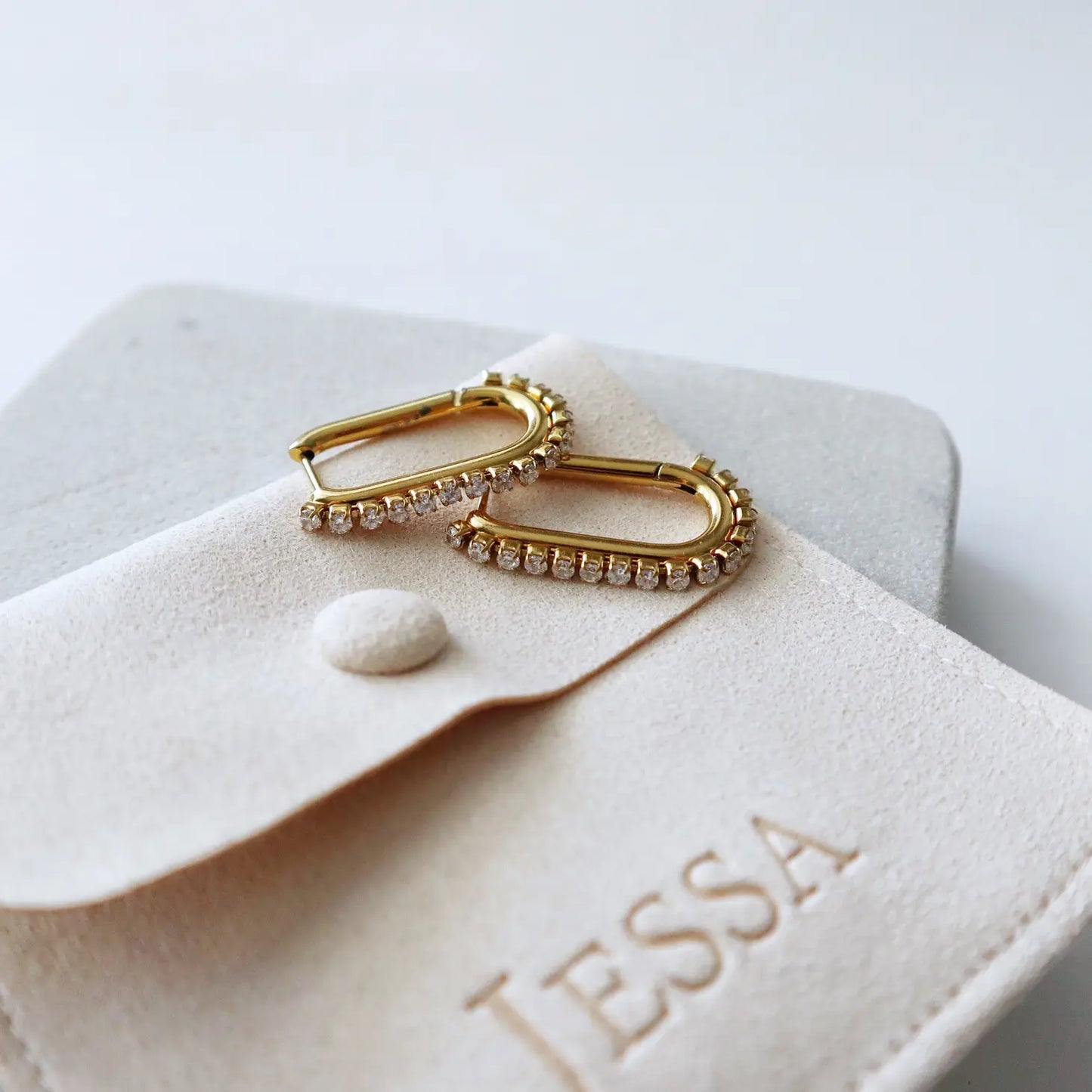 Jessa Jewelry's CZ Oval Hoop Earrings. 