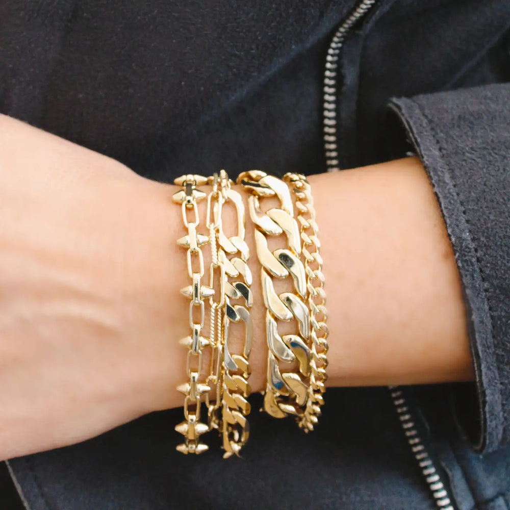 
                      
                        Woman wearing the Addie Bracelet by Jessica Matrasko Jewelry alongside other bracelets
                      
                    