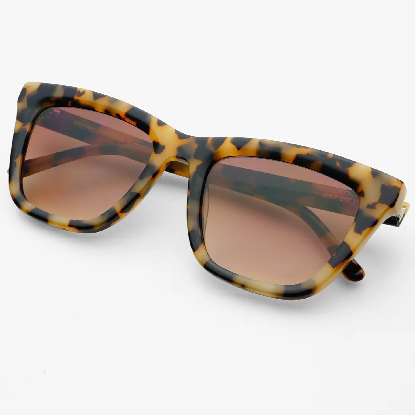 Embrace vintage glam style with the FREYRS Lucy Acetate Womens Cat Eye Sunglasses. Find your pair at Harbour Thread boutique in St. Pete, FL!