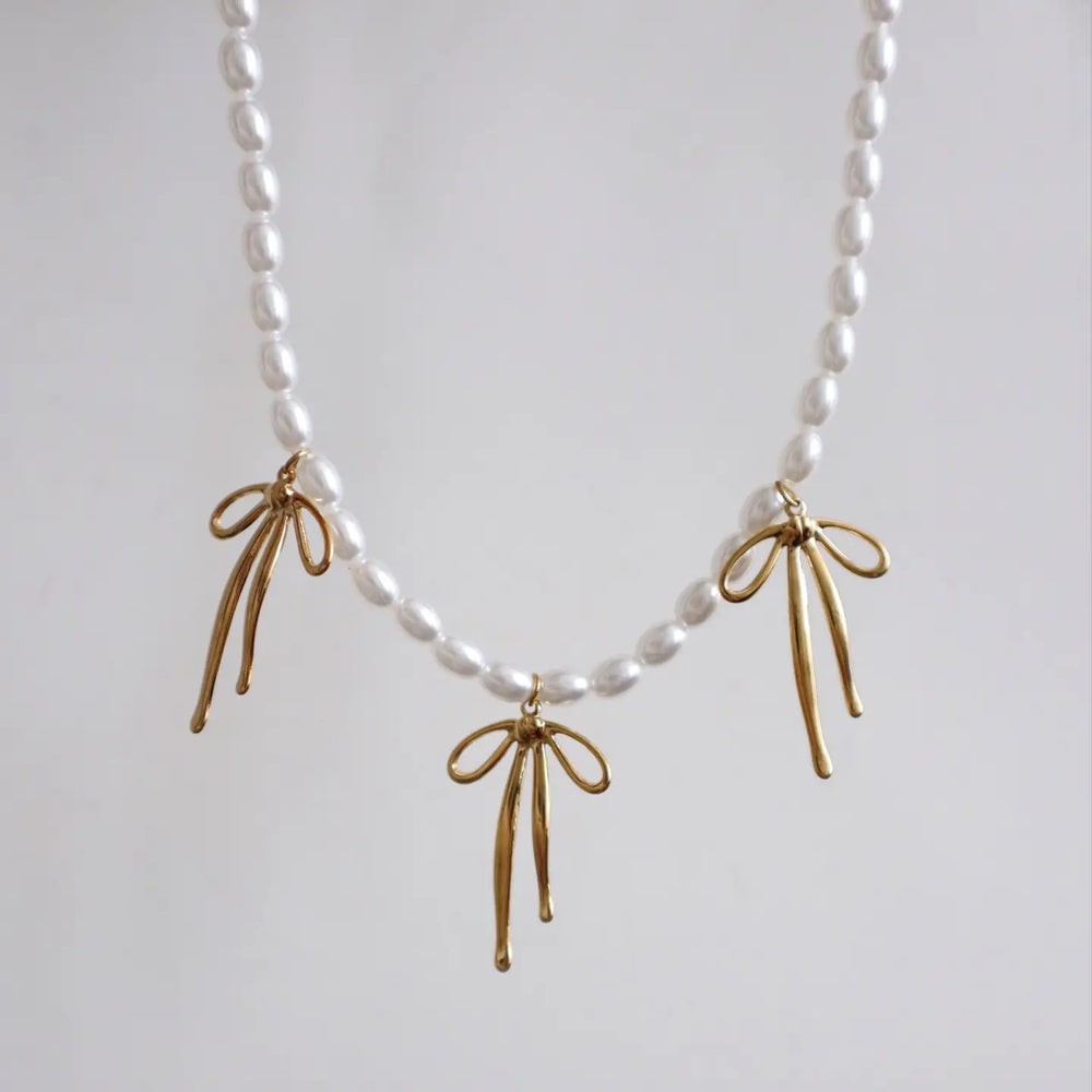 
                      
                        The Pearl Bliss Bow Necklace by Jessa Jewelry at Harbour Thread
                      
                    