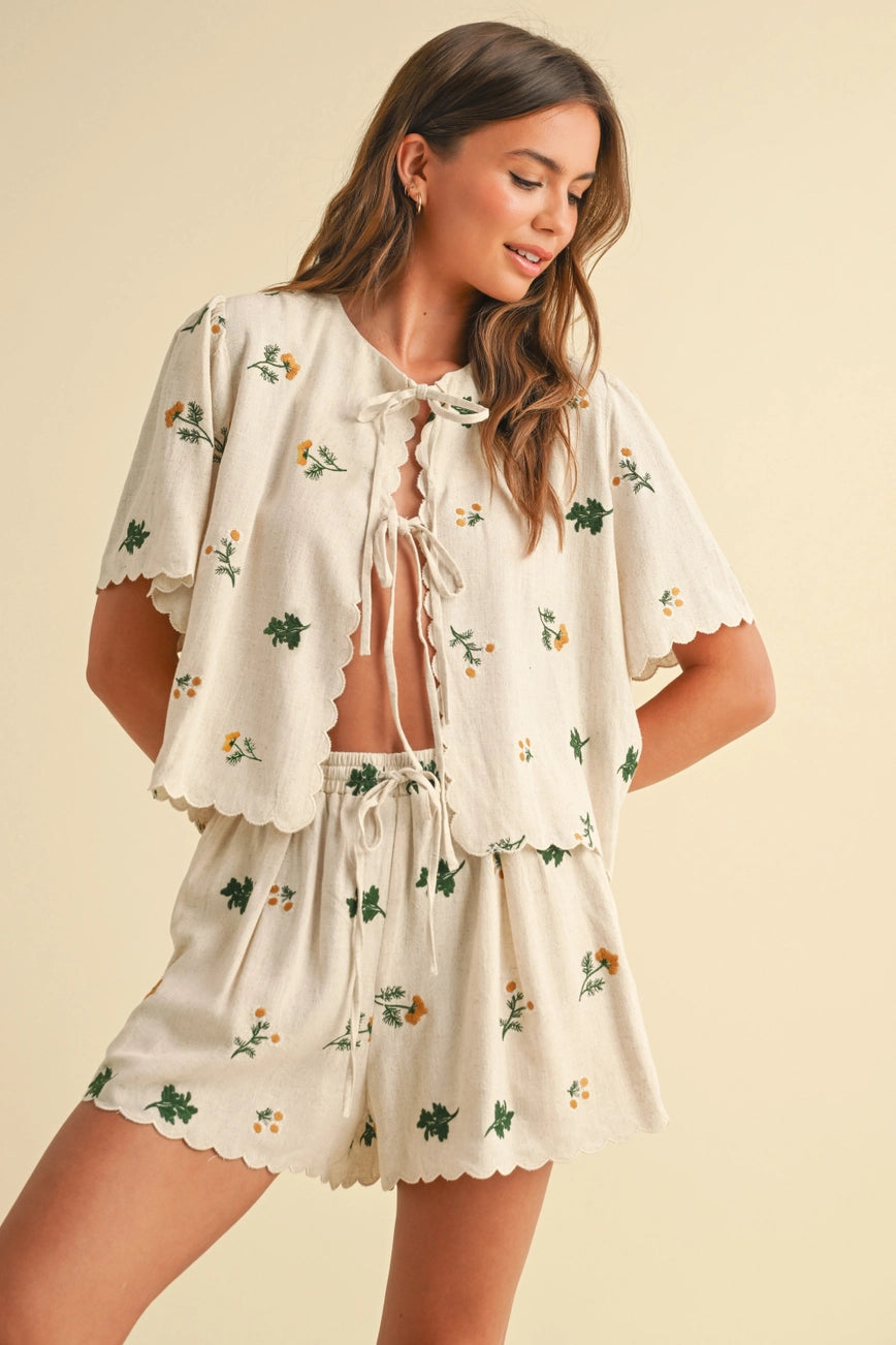 Embrace charming, warm-weather style with these sweet Floral Embroidery Linen Shorts, now available at Harbour Thread women's boutique in St. Pete, FL. 