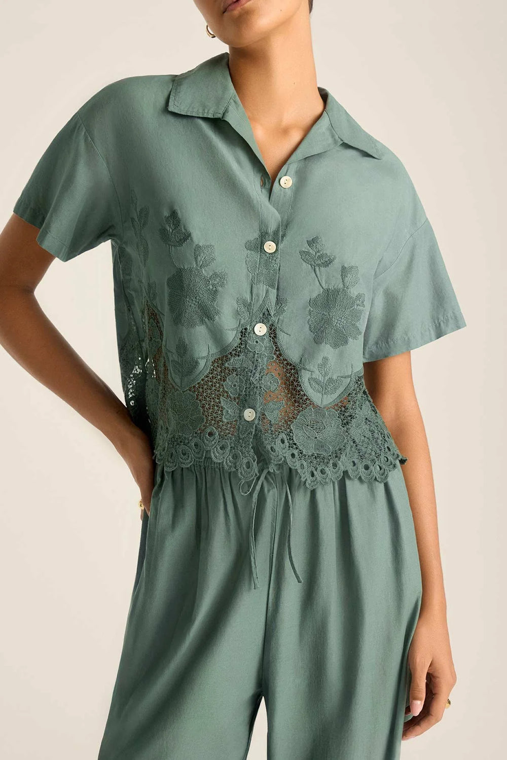 Enjoy resort-ready style with the Vitamin A Flora Beachside Broderie Cropped Shirt, now available at Harbour Thread. 