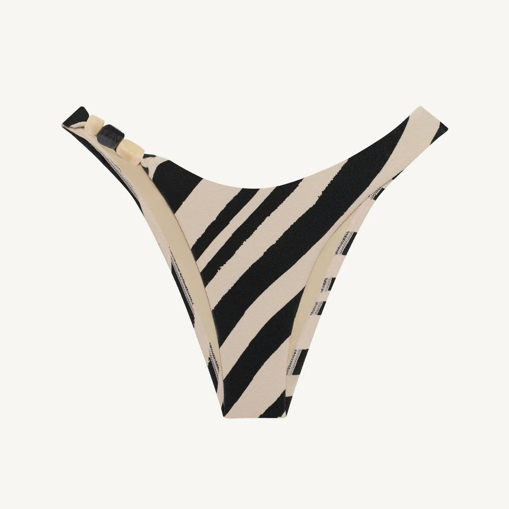 
                      
                        The Sandbar Stripe Terra Cheeky Bikini Bottoms by Vitamin A are at Harbour Thread.
                      
                    