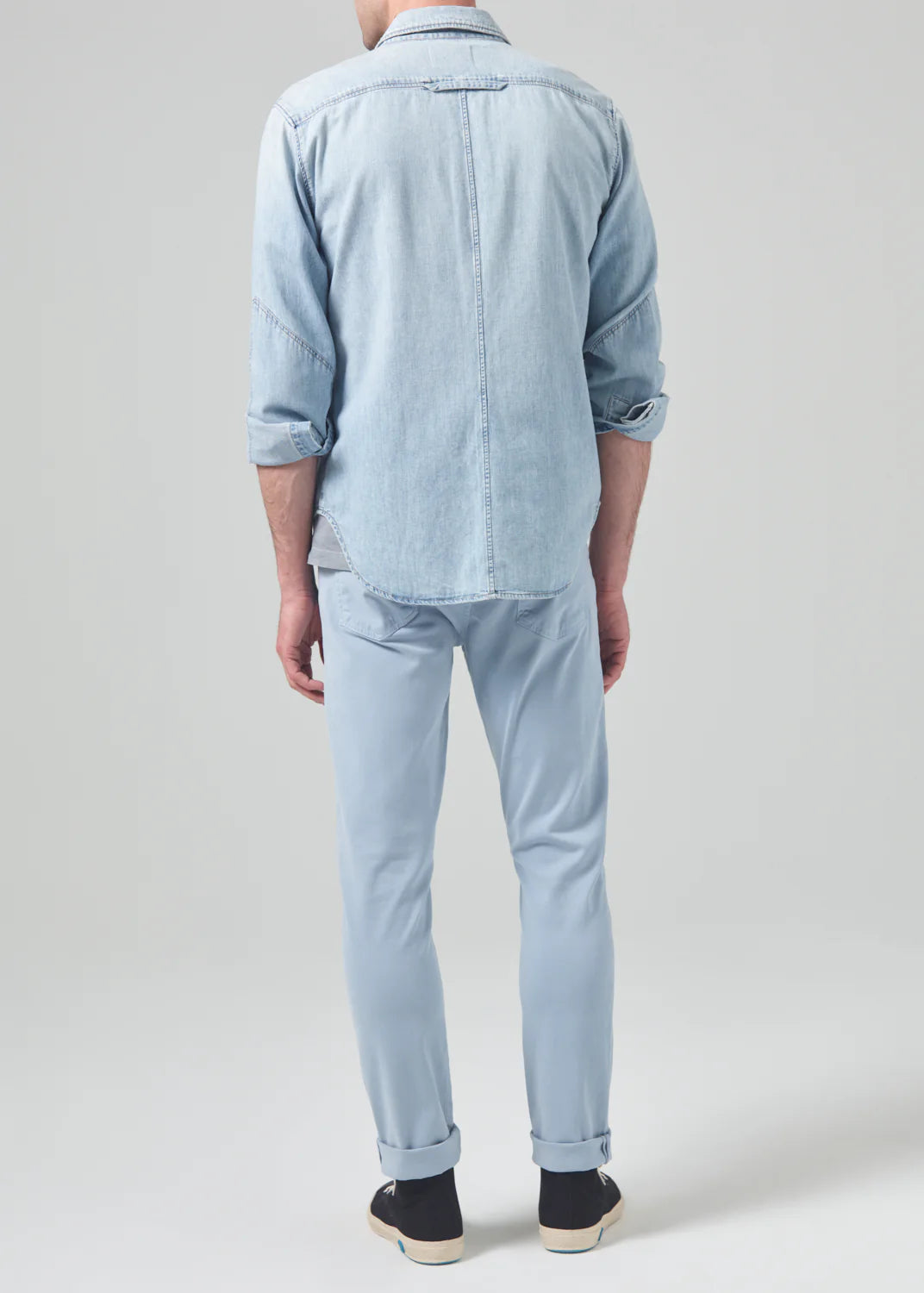 Back view of The Citizens Of Humanity London Tapered Slim Stretch men's pant in the color Seagull