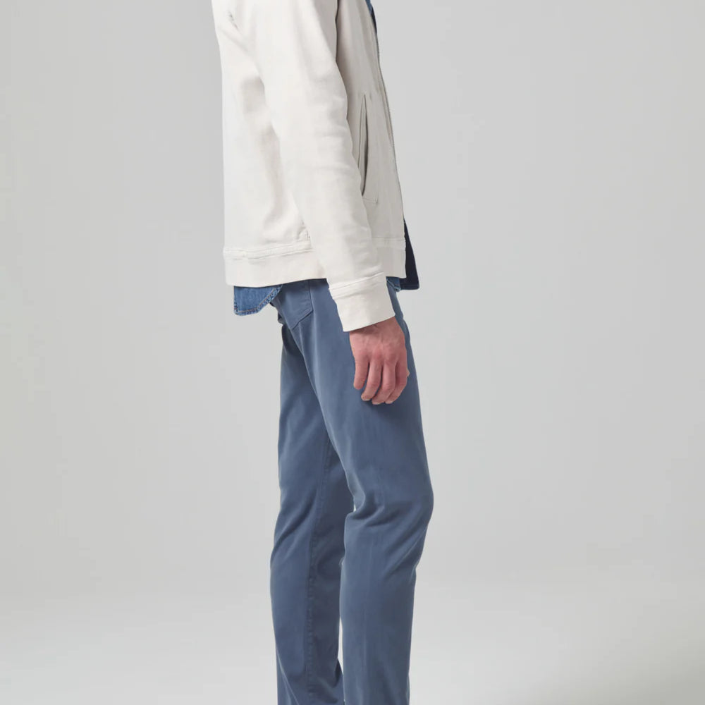 
                      
                        Side view of the muted blue London Tapered Slim Stretch Men's Pant from Citizens of Humanity
                      
                    