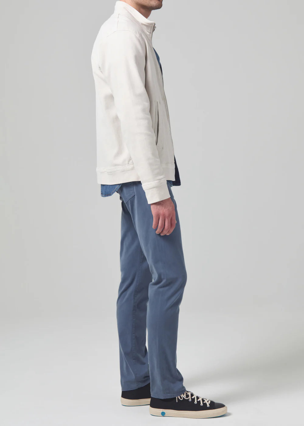 Side view of the muted blue London Tapered Slim Stretch Men's Pant from Citizens of Humanity