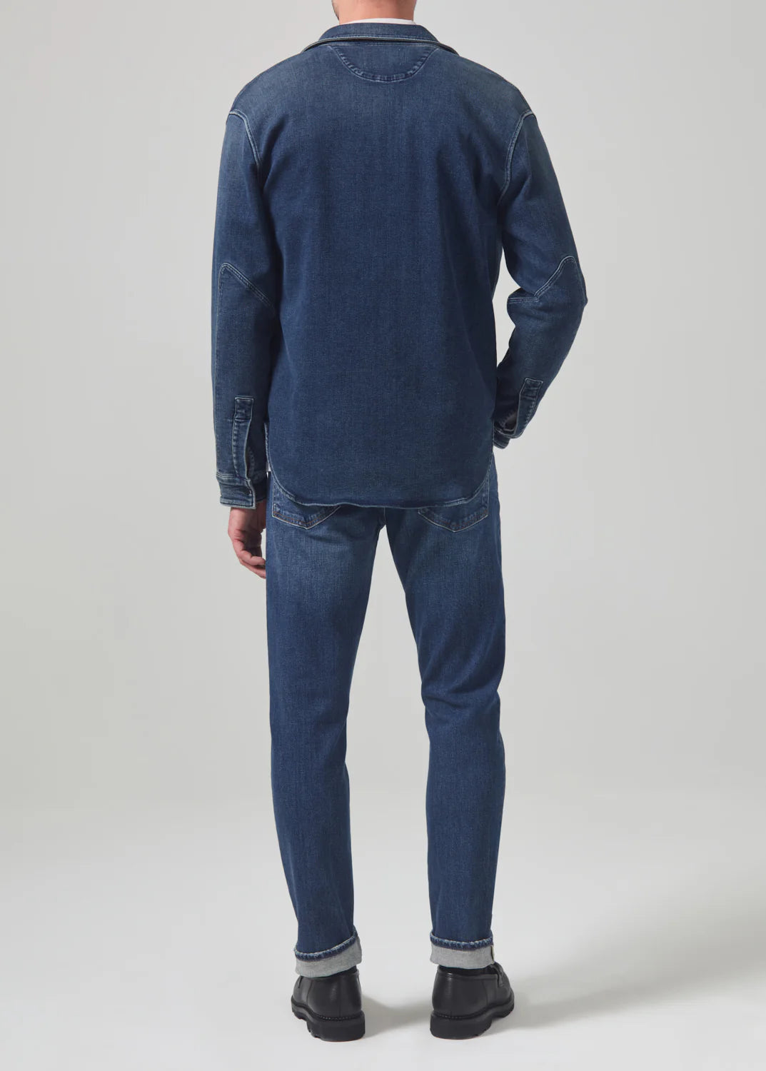 Back view of a man wearing the Parquet London Tapered Slim Archive Men's Jeans by Citizens Of Humanity