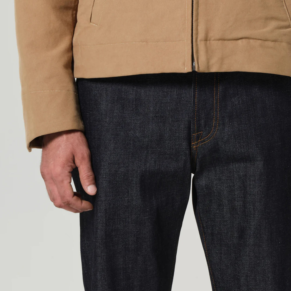 The raw selvedge wash on the Ando Citizens Of Humanity men's jean is a clean dark indigo non stretch deadstock Japanese raw selvedge cotton with a durable hand