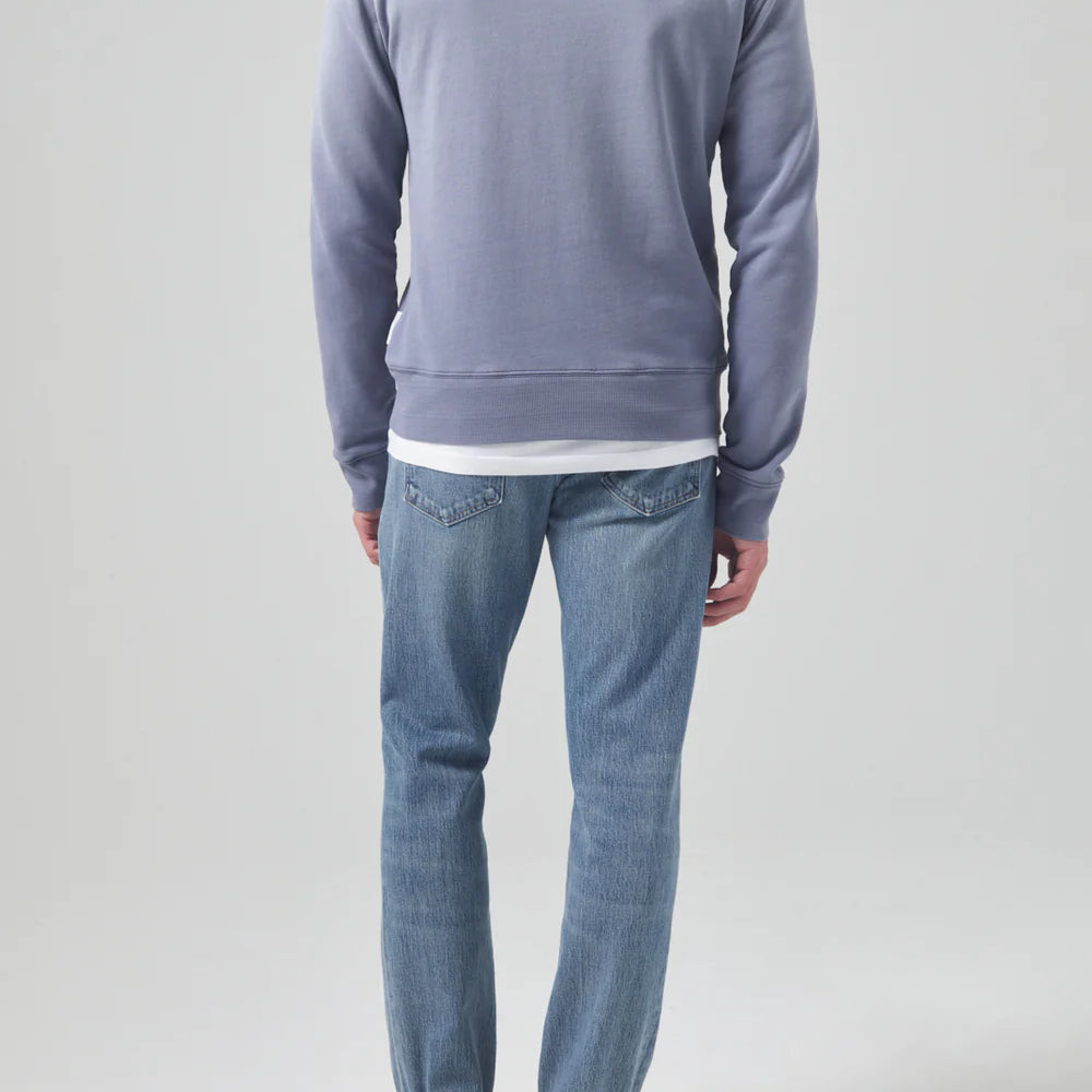 Back view of the medium indigo Citizens Of Humanity Gage Slim Straight Archive Men's Jeans
