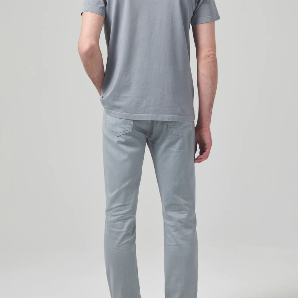 Back view of the Citizens Of Humanity washed out blue grey Gage Slim Straight Stretch Linen men's pants