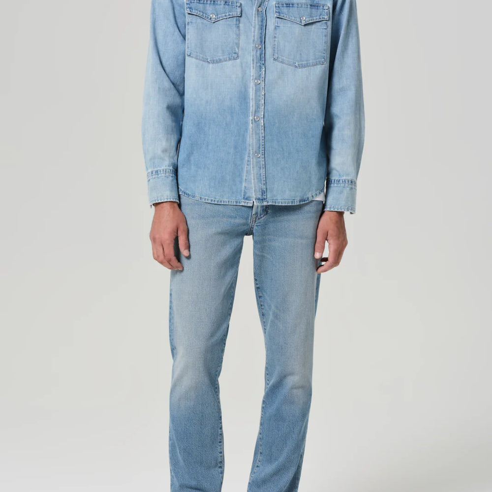These tapered classic men's jeans by Citizens of Humanity fit fuller through the hips and thighs and narrow below the knee to the ankle.